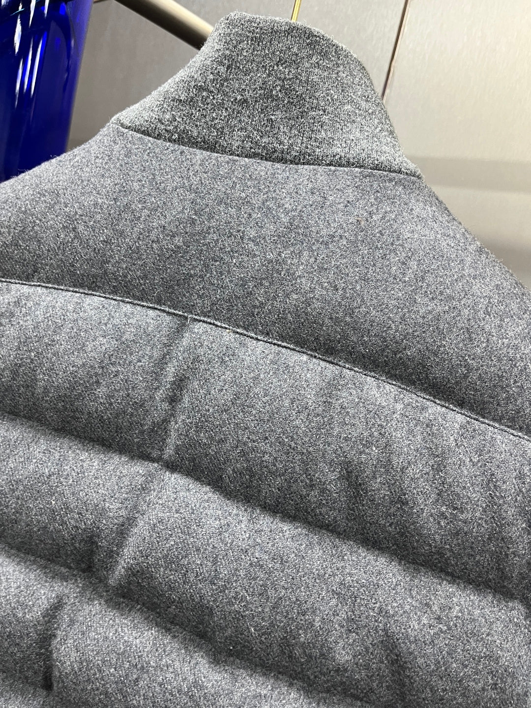 트리밍 가죽패딩 (trimmed leather padding)