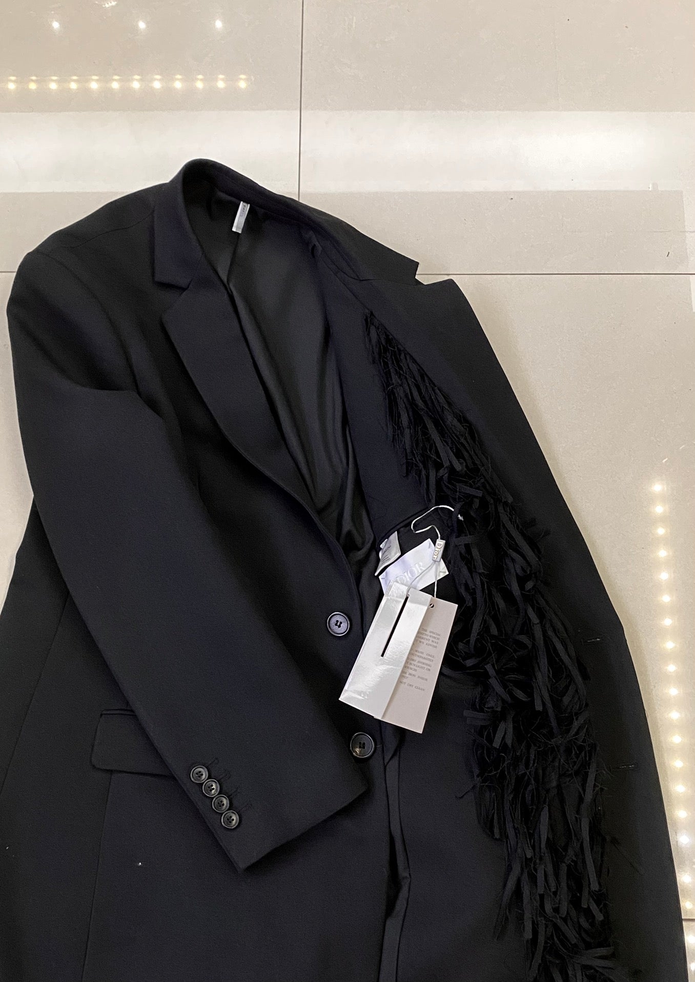 태슬코트 (tassel coat)