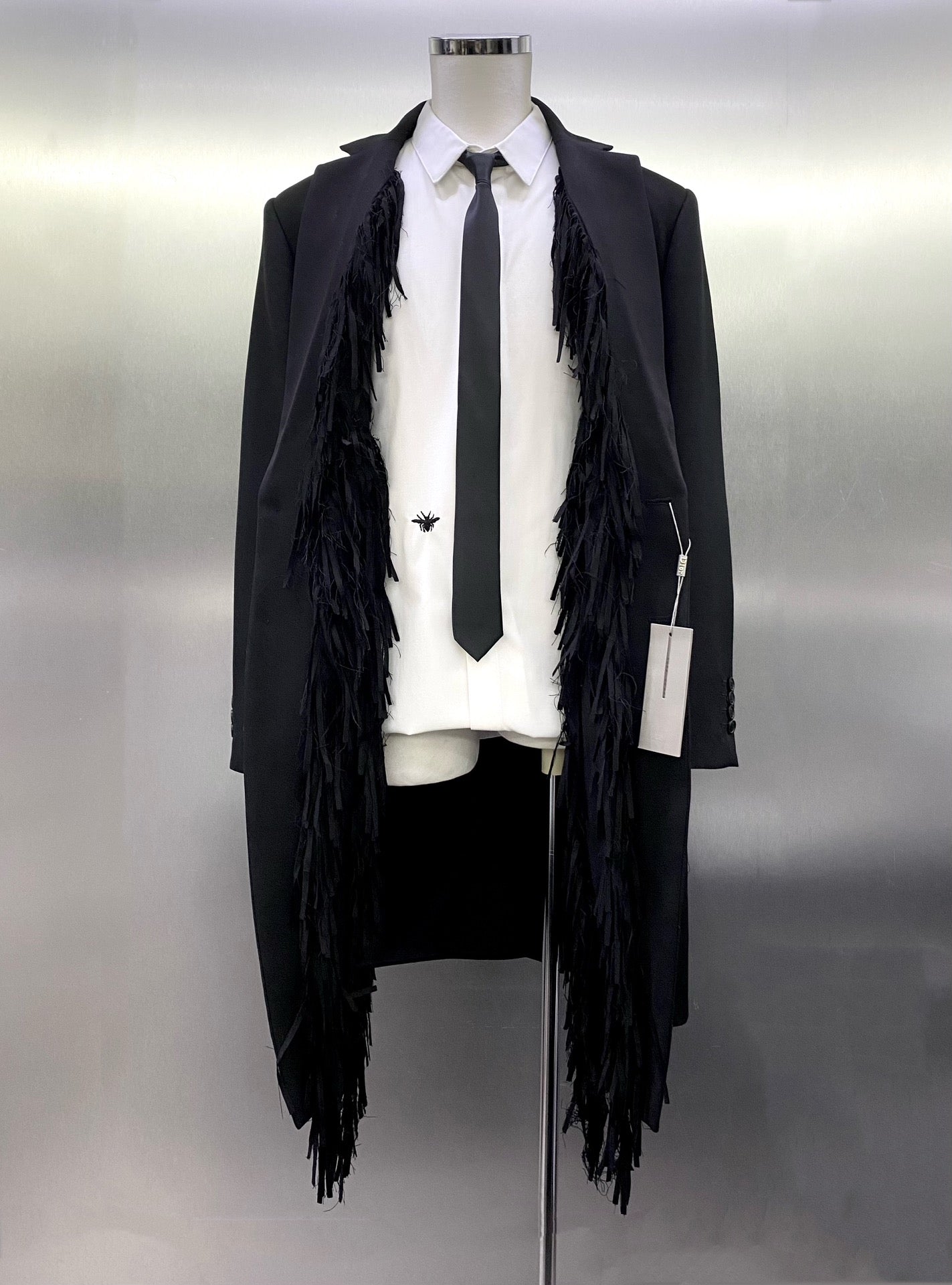 태슬코트 (tassel coat)