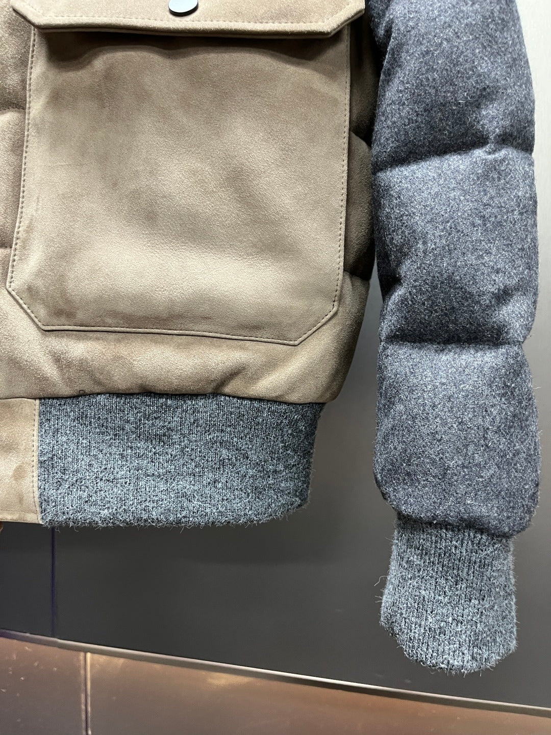 트리밍 가죽패딩 (trimmed leather padding)